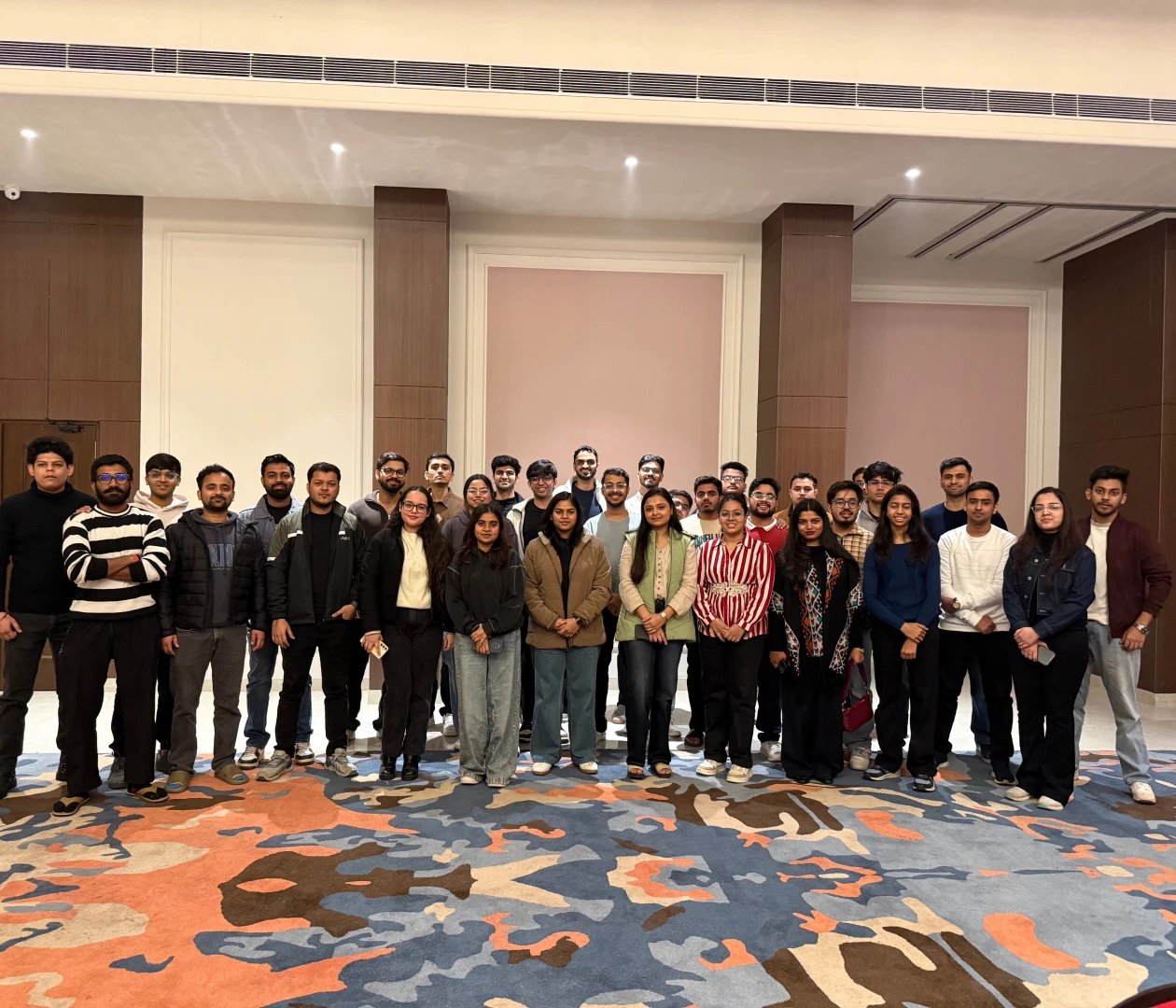 RealVal team gathering — professionals collaborating in an office setting